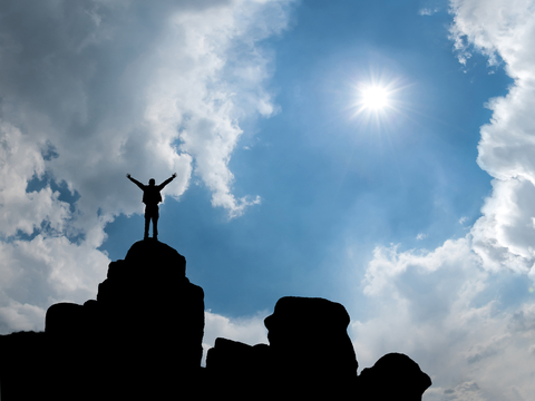 A person successfully climbed a mountain.